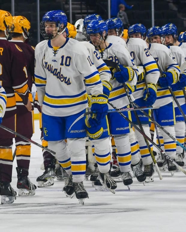 St. Cloud Cathedral boys hockey team shakes hands with Northfield on March 6 after the 2024 Class 1A state tournament opening round at the Xcel Energy Center in St. Paul. Cathedral won 5-1.